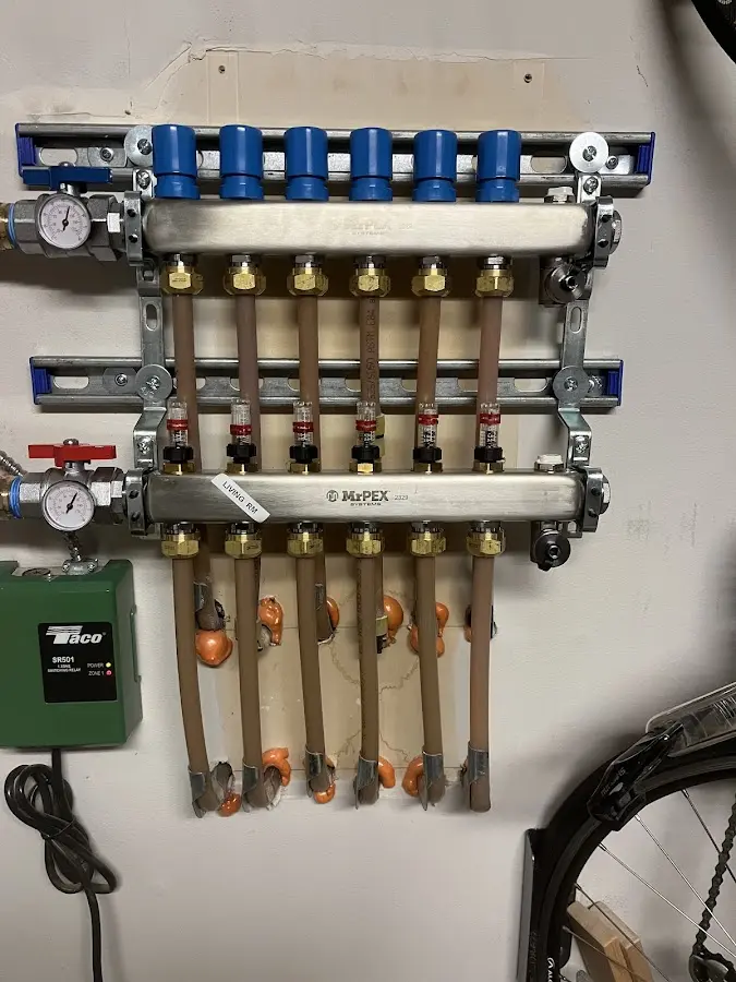 Plumber performing Gas Line Installation at a residential property in Barre